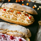 Eclair with cranberries and almonds